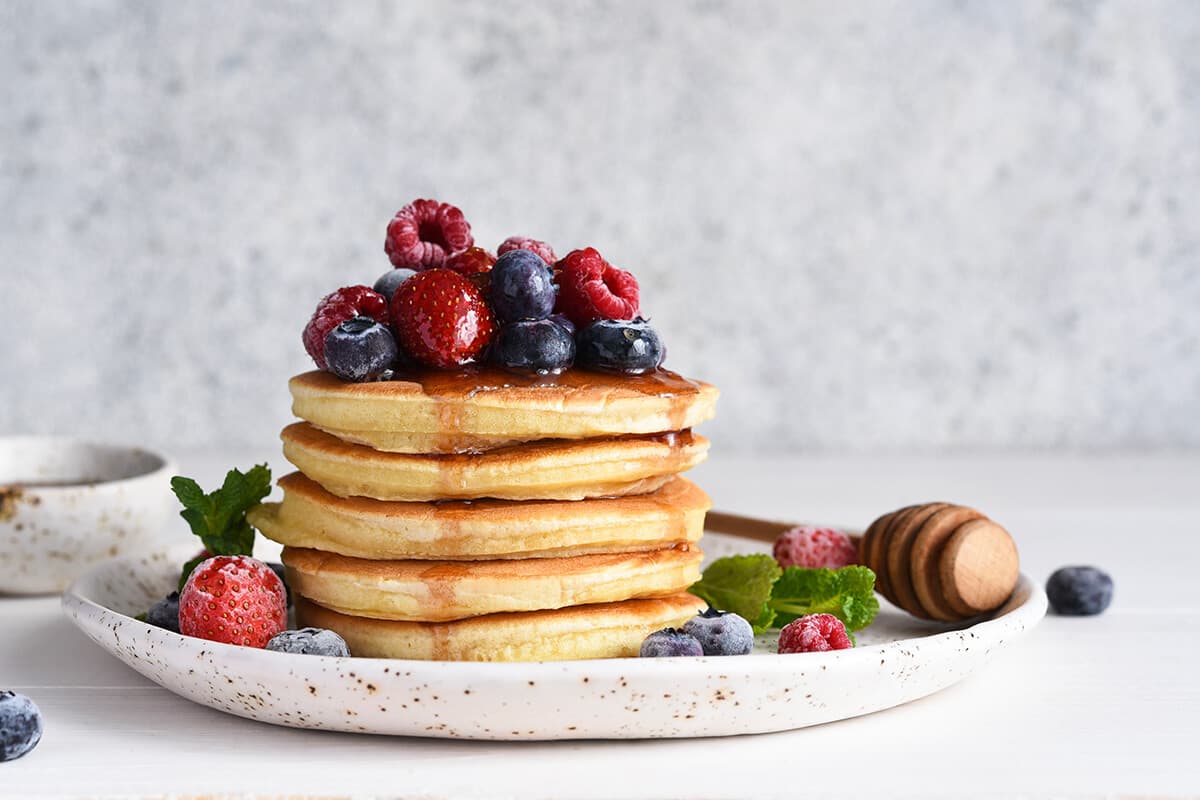 Pancakes with syrup and berries