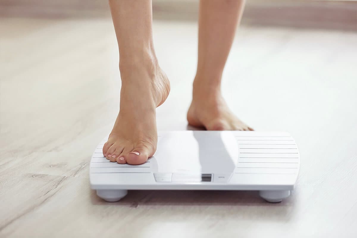 Standing on scales
