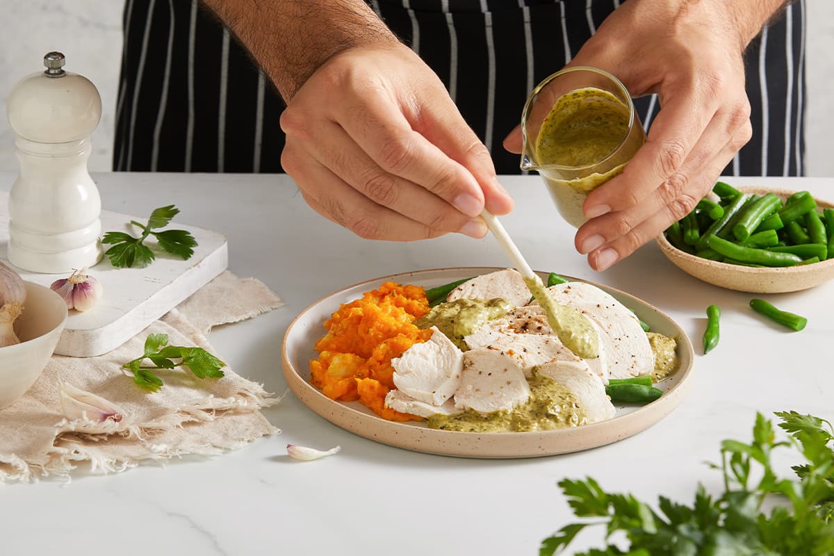 My Muscle Chef Chicken & Chimichurri Mayo with Pumpkin Mash & Green Beans plated