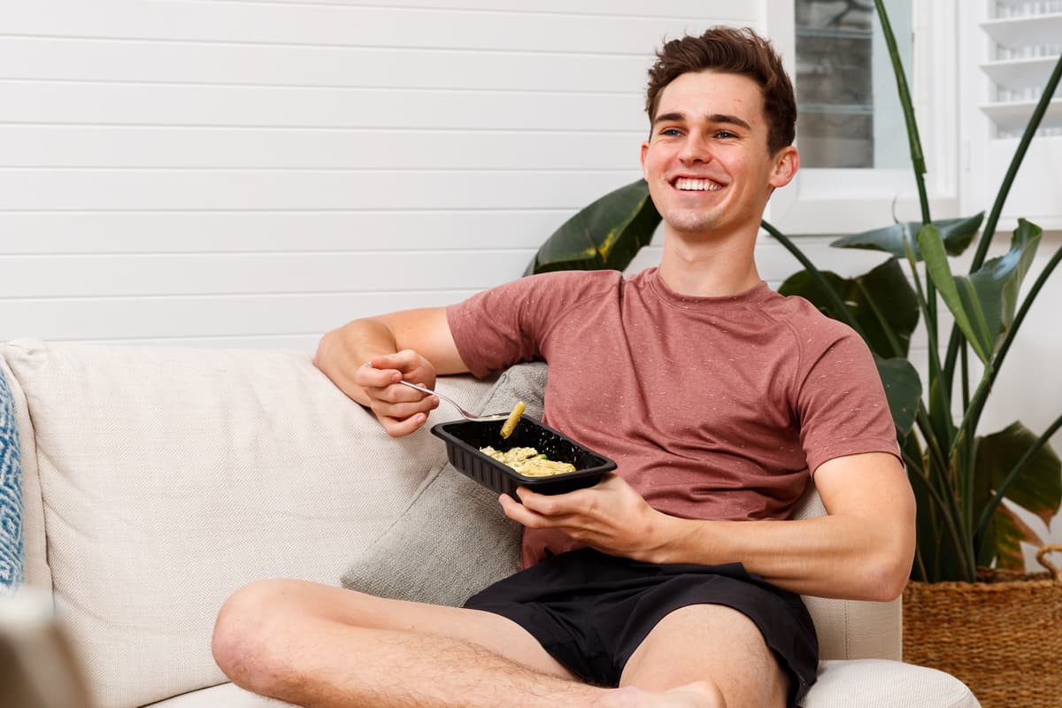 Nicholas Fitness & Yoga Instructor eating a My Muscle Chef Meal