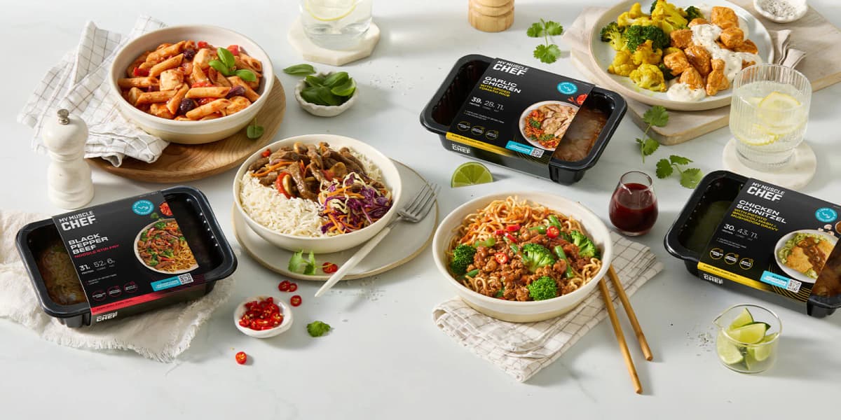 Plated and packaged meals on a table