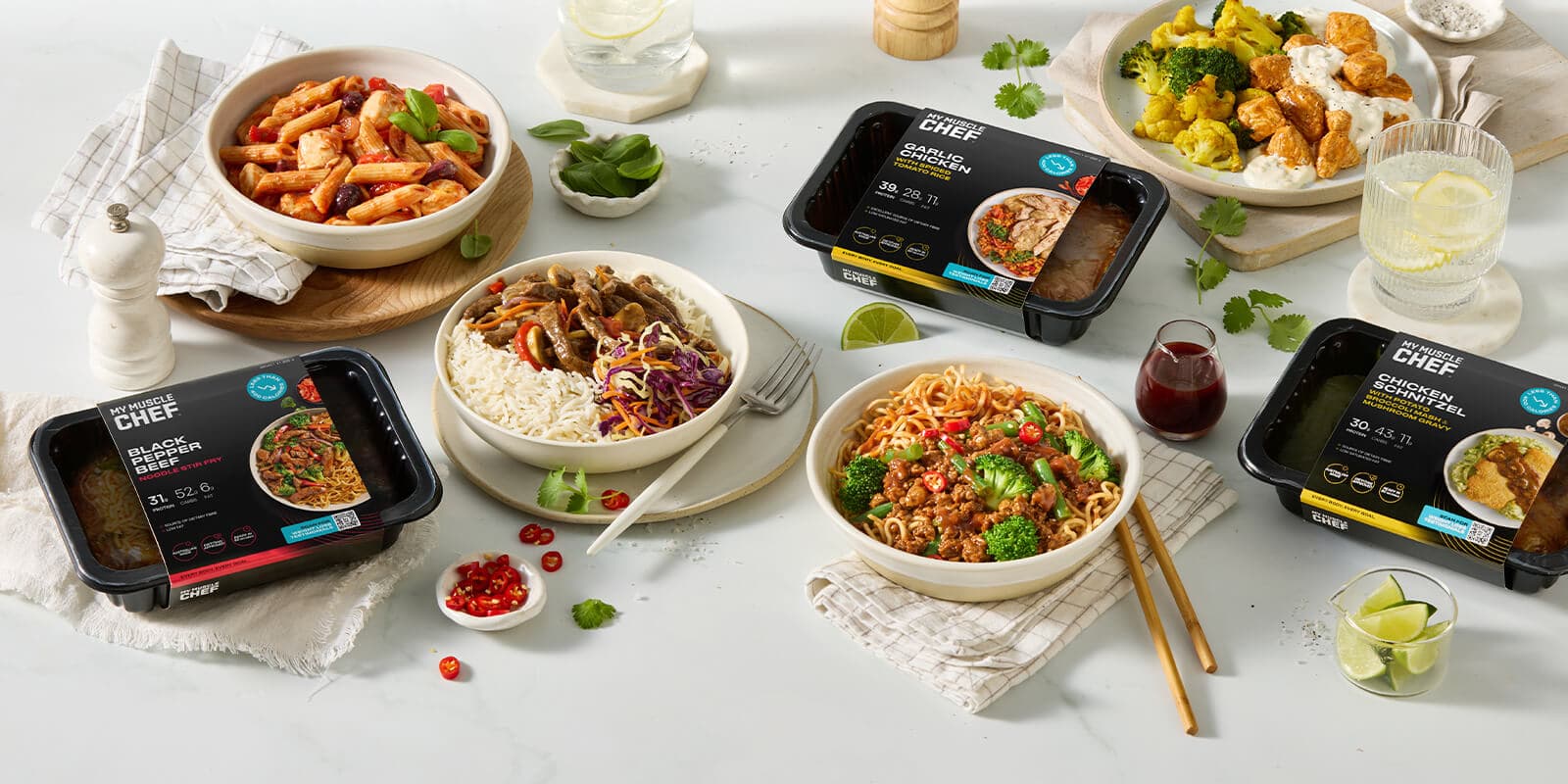 Plated and packaged meals on a table